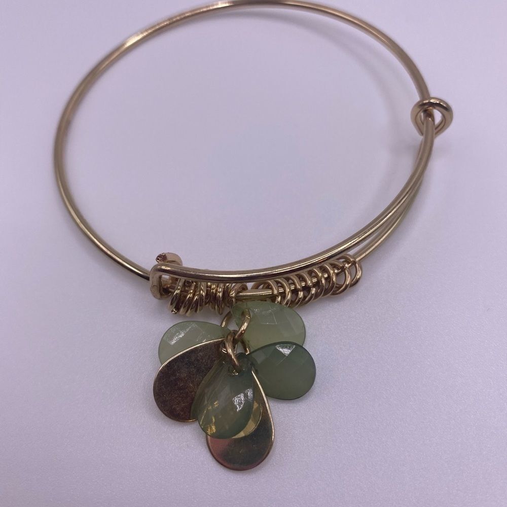 4/$20 Gold tone bangle with floating green beads